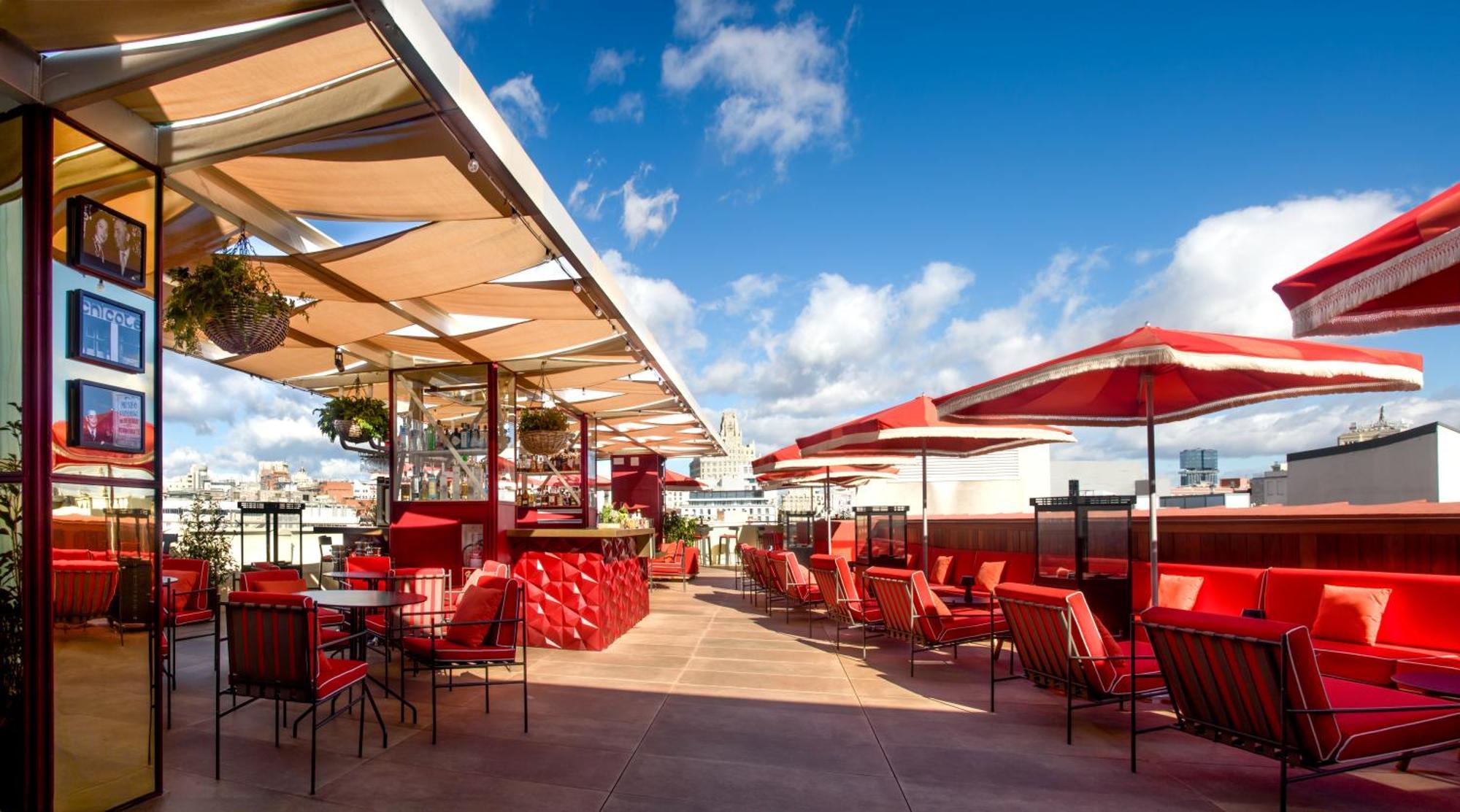 UMusic Hotel Madrid Exterior foto The rooftop bar at the Hotel du Louvre